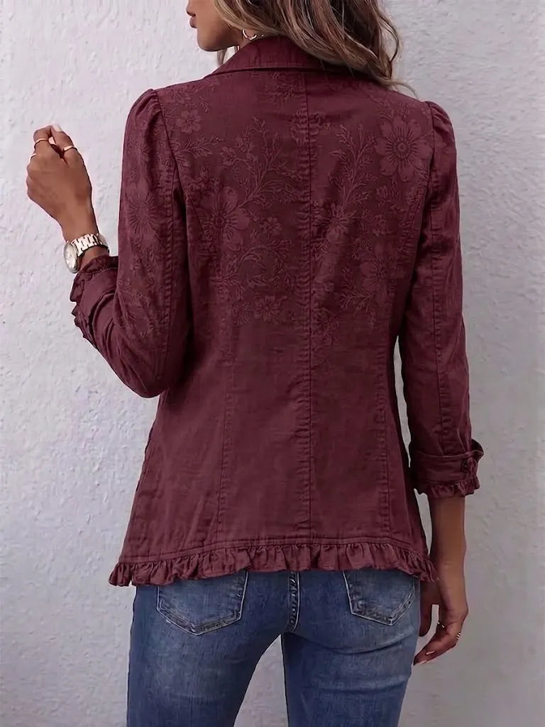 Boho-style Vintage Jacket With Subtle Floral Pattern And Ruffle Details.